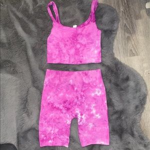 Pink biker shirt snd sports bra set.